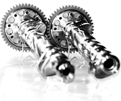 La CAT CAMS, avem tehnologia de a șlefui arbori cu came cu lobi de came înclinați datorită mașinii noastre de șlefuit CNC, care poate seta mișcarea întregului ansamblu roată de șlefuit la același unghi cu mișcarea ridicătorului. Acest lucru este necesar pentru motoarele cu supape îndreptate spre centrul camerei de ardere. Un exemplu de top este motorul Ferrari 333 SP, cu 5 supape pe cilindru (vezi imaginea). Supapele de admisie exterioare având un unghi de 3° față de centru. Cele 2 supape de evacuare au inclus un unghi de 8° unul față de celălalt.  Motoarele de producție ulterioare, cum ar fi F355 și F360, se bucură de aceeași tehnologie și pot beneficia și de upgrade-uri CAT CAMS pentru arbori cu came și componente aferente trenului de supape.